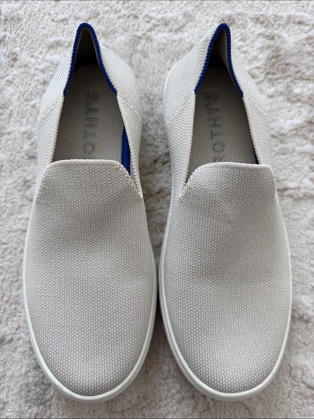 Rothy's Women’s Slip-On Loafers in Off-White with Blue Trim